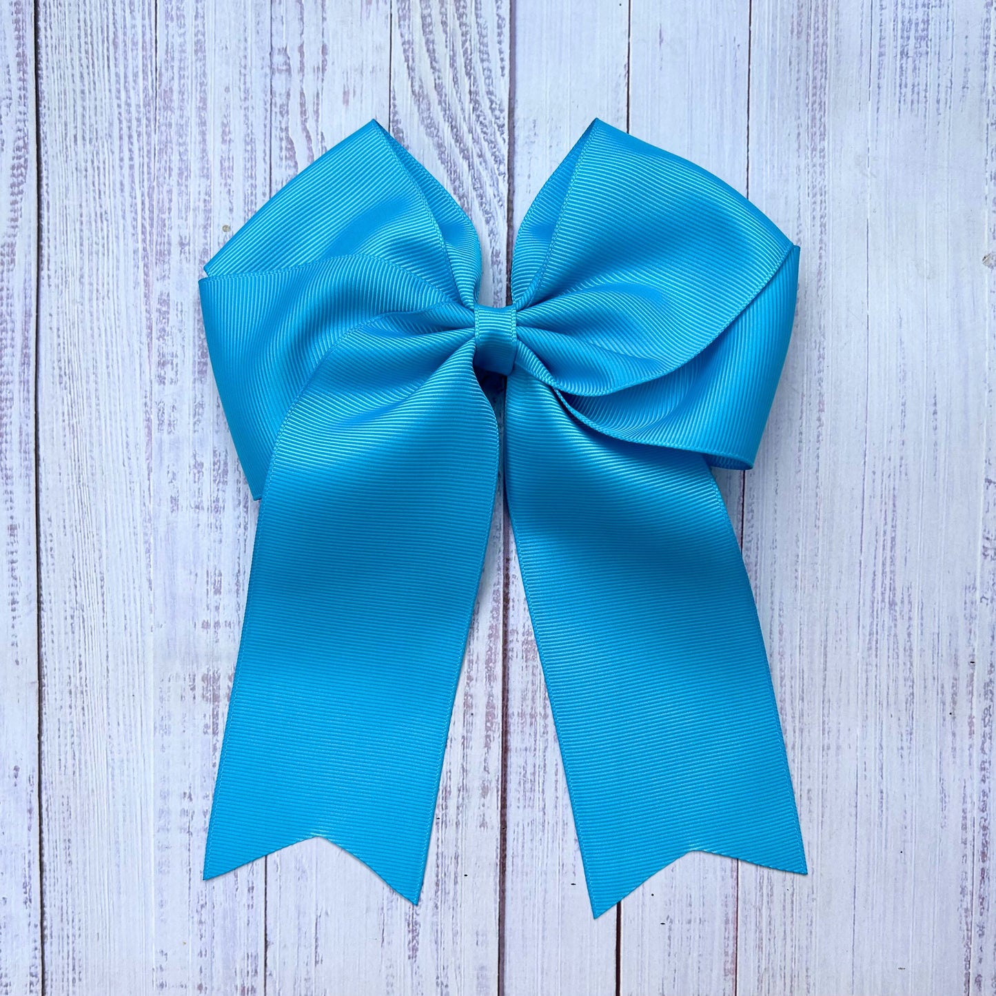 Cute Tale Bow Turquoise Hair Bow